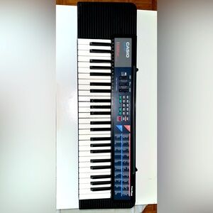 Casio Black and White Electronic Keyboard